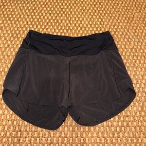 Lululemon Black High Rise 4”